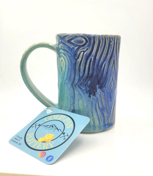 Handmade blue and teal pottery mug