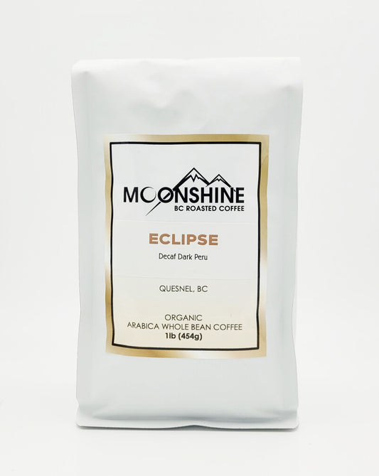 Eclipse is a dark roasted arabica bean from Peru.  This wonderful coffee bean has been decaffeinated through the swiss water process.  Moonshine Coffee is a small, artisan, micro-roaster that roasts only organic, fair trade, and direct trade coffee from around the globe.  The roasting is done by hand and in small batches, creating a cup of coffee so good that it should be illegal!   Available Sizes:   1 pound (454g) 1/2 pound (226g)